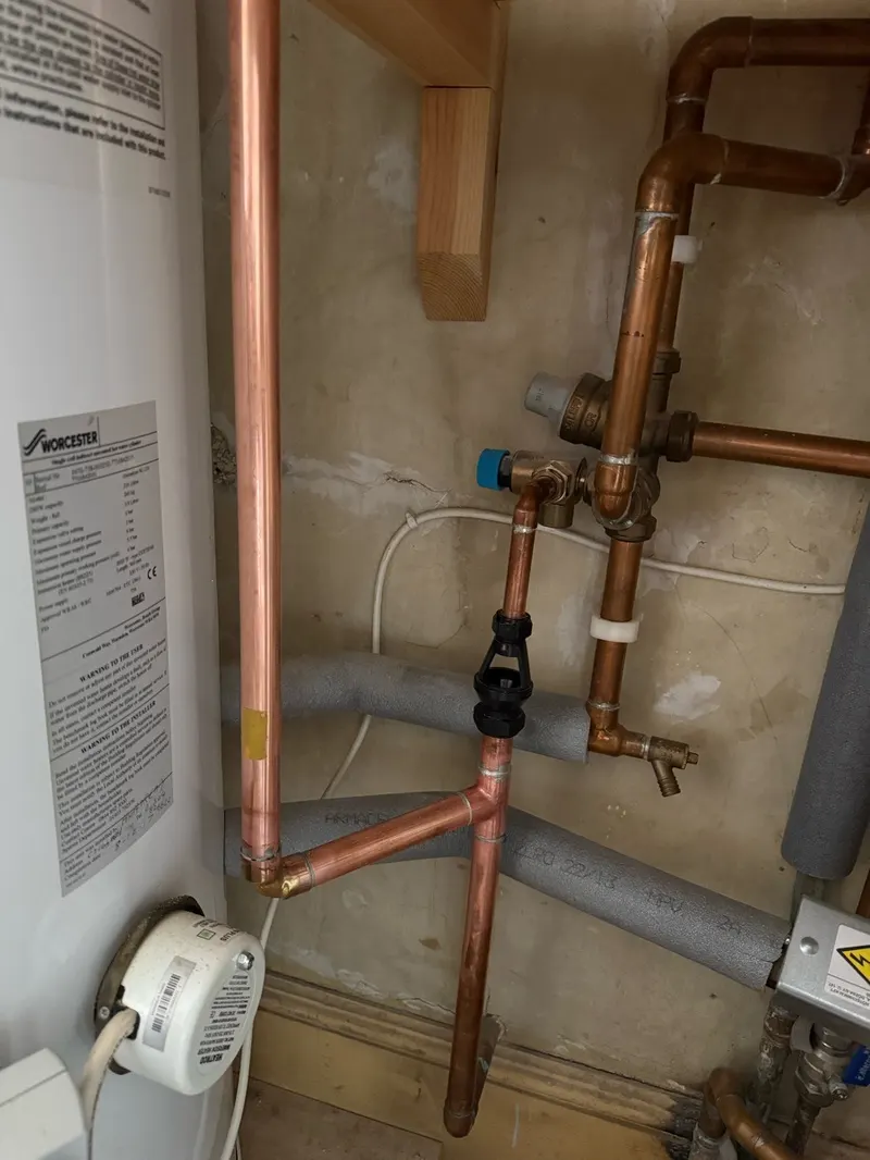 Worcester unvented cylinder with new blending valve and pipework