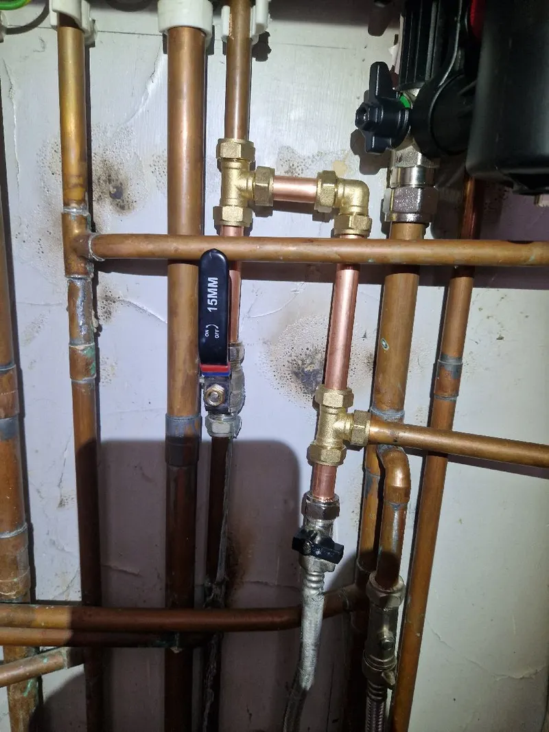 New copper and brass pipework with isolation valves