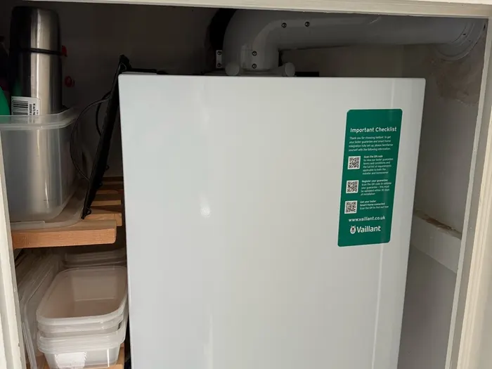 Vaillant boiler in an airing cupboard, ready for its annual service