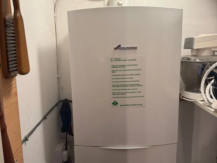 Worcester boiler in a working kitchen with appliances around it